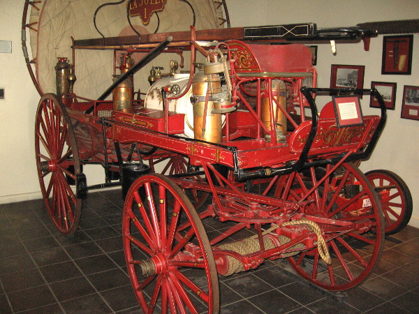 "Old La Jolla" hand drawn fire engine dating from 1886, on display at The San Diego Firehouse Museum.