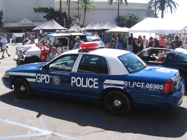 Commissioner Gordon must be nearby. I spotted his Gotham Police Department vehicle.