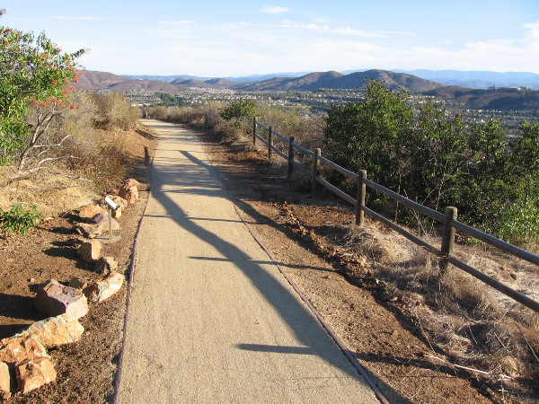I'm hiking down the easy Jas Arnold Trail For All People on Black Mountain early one Saturday morning. The sun had just risen and few people were about.