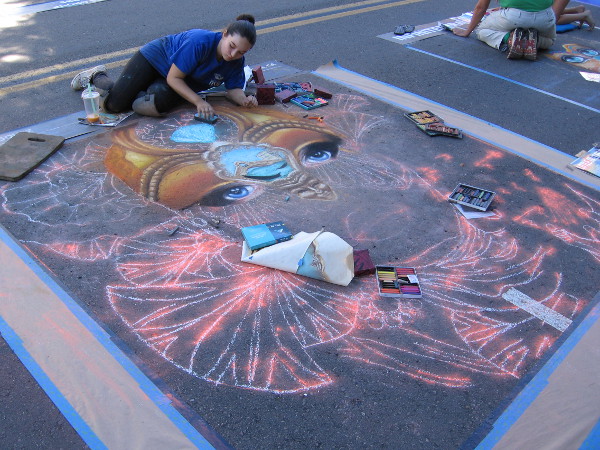 Elaborate chalk artwork, also known as Gesso Italiano, is being created the day before 2016 Festa begins in Little Italy.