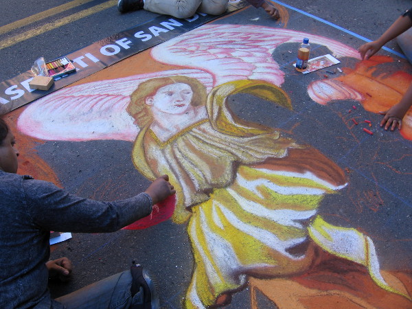 A colorful chalk angel in Little Italy.