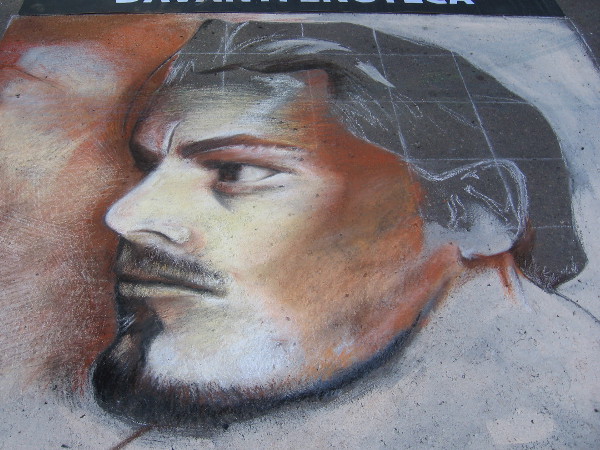 Stan Tang. A strong masculine face drawn with chalk.