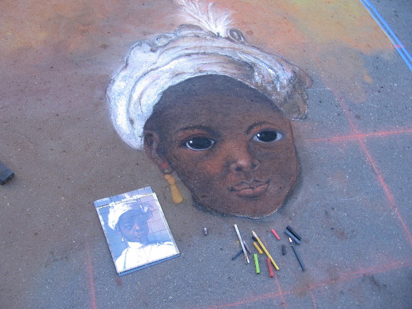 Lisa Pierre-Davis. A life-filled chalk character at 2016 Festa in Little Italy!