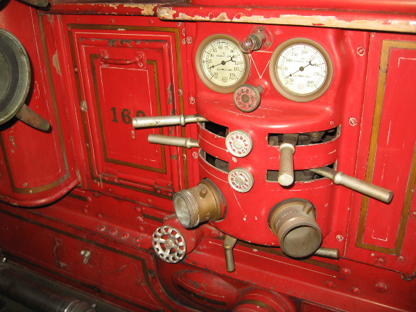 Water pressure controls on the side of one pumper.