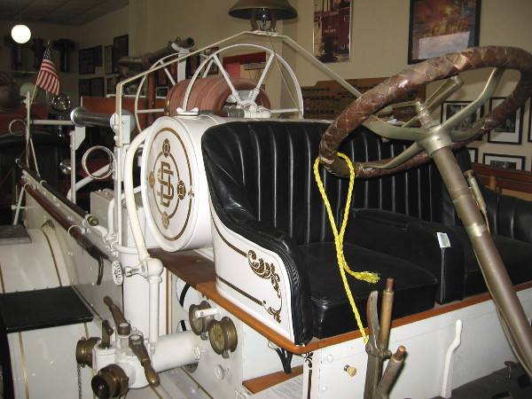 Another look at the historic 1915 Panama-California Exposition fire engine. This section of the Firehouse Museum is a bit dark and close, which makes it hard to take a good wide photo.