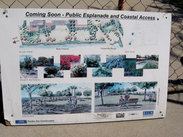 Sign declares Coming Soon - Public Esplanade and Coastal Access. Sketches show people enjoying the new park.