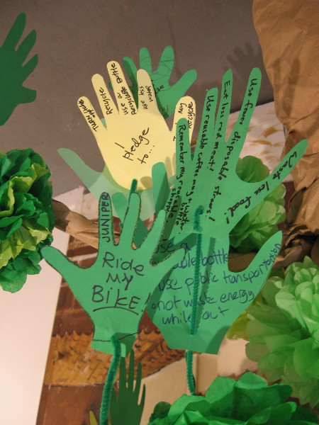 Leaves on the Tree of Change. Kids pledge to ride bikes, turn off lights, recycle, use less water . . .