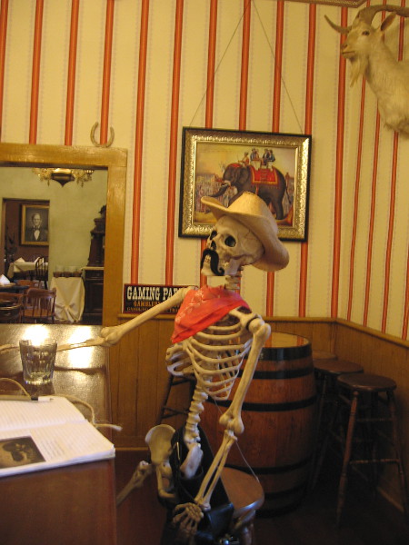 A bony customer at the bar. That must have been a stiff drink.