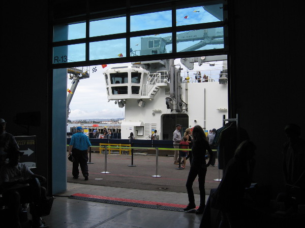 Peering out of the Port Pavilion at the RV Sally Ride, docked at San Diego's Broadway Pier.