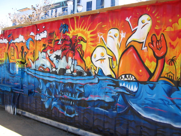 Sun, water, hungry sharks and a tropical island. I'm not exactly sure what is going on in this crazy street art created by Nick McPherson and MR DVICE.
