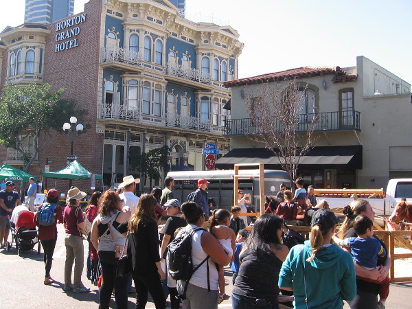 The Horton Grand Hotel rises behind a crowd of people enjoying the 2016 Fall Back Festival, an annual event that celebrates a fascinating period in San Diego history.
