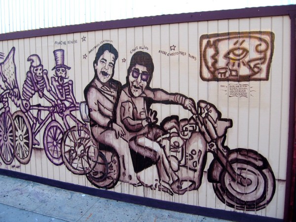 A long mural painted on a building at the corner of National Avenue and Evans Street honors four lives that were lost during a tragic accident in Chicano Park on October 15, 2016.