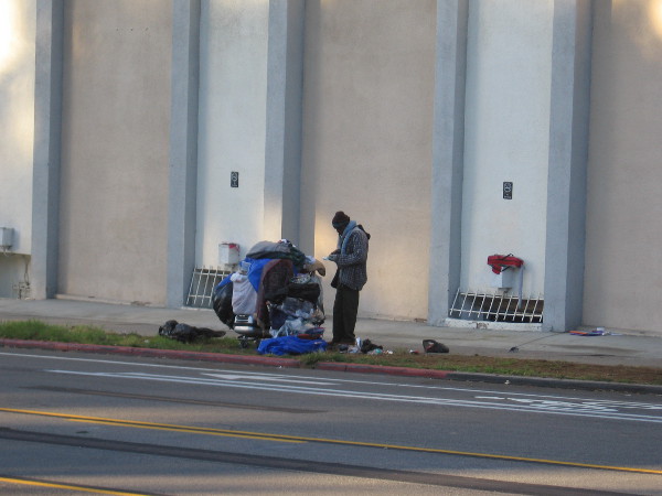 Homeless man on Sixth Avenue, across the street from the west edge of Balboa Park.