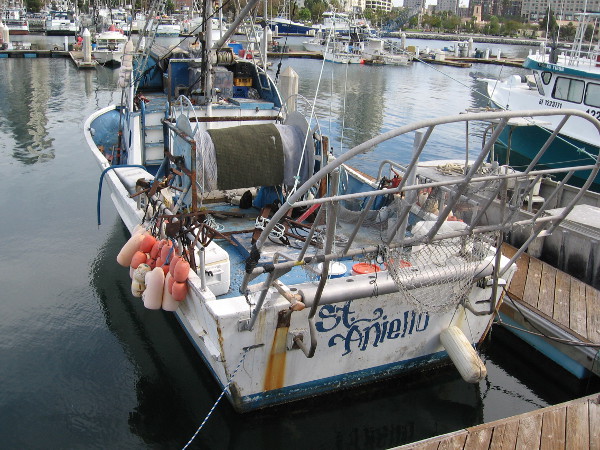 A colorful fishing boat in Tuna Harbor. Sun, sweat, grit and real life. The source of your elegant dinner.
