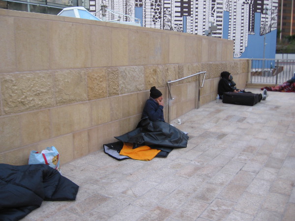 The relatively new Horton Plaza Park now attracts many homeless. A sad situation with no easy solution.