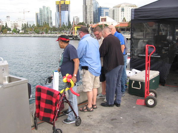 Something below in the water has caught their attention...