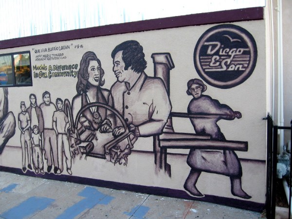 The mural is titled Que Viva Barrio Logan, by artist Mario Torero. It's painted on the side of Diego and Son Printing. Making a difference in our community.