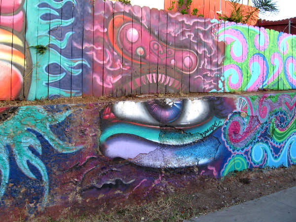 A large eye watches Evans Street, a block southeast of Chicano Park.