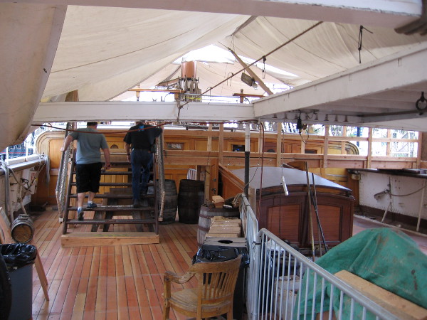A bridge was erected so that visitors boarding the historic tall ship could cross the port side where construction is underway.