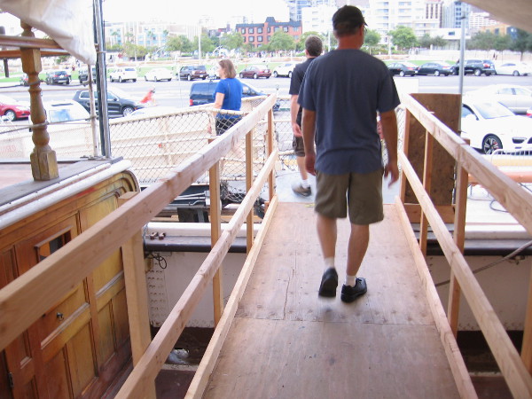 Crossing a temporary bridge above the deck of the Star of India, the world's oldest active sailing ship!