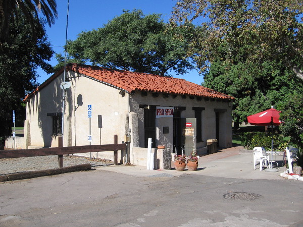Photo of the small, historic adobe across the parking lot of the Presidio Hills Golf Course. Built around 1810, it's the oldest structure that is still standing in San Diego.