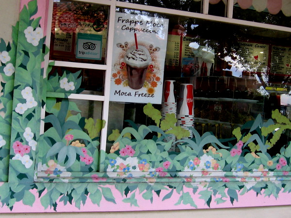 Floral designs around one window of the Seaport Fudge Factory.