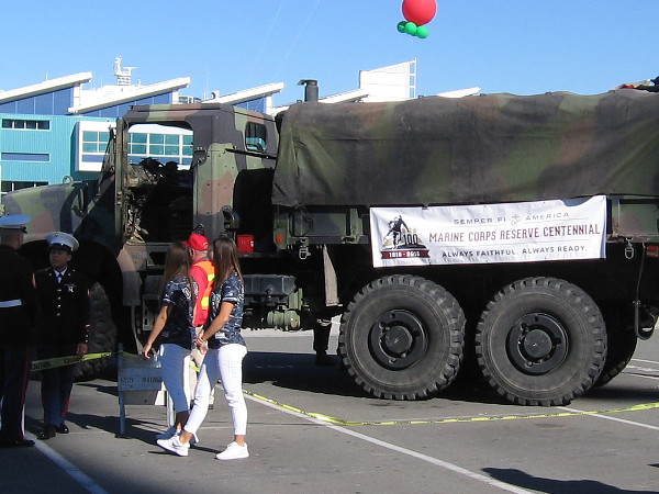 Donated toys will fill this United States Marine Corps truck. A banner on its side commemorates the Marine Corps Reserve Centennial.