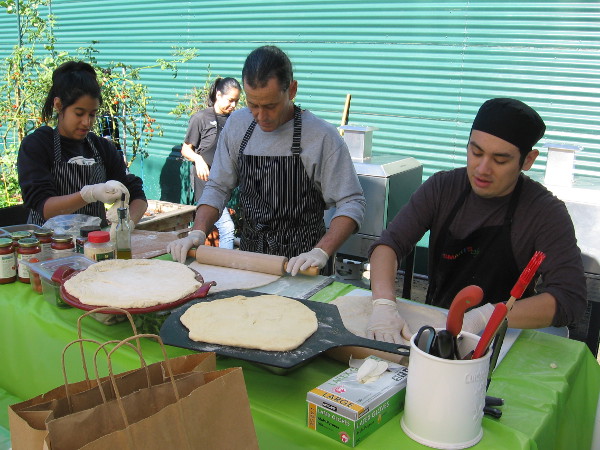 These guys were rolling out yummy pizzas!