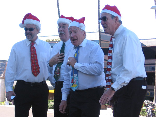 A musical quartet belonging to the Pacific Coast Harmony of La Jolla serenades people along the parade route! Great voices!