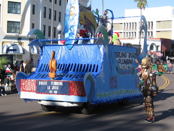Just a fun float featuring a surfboard and Dr. Seuss characters. Like many, it was created by a local business. I've photographed the guy in the crazy Darth Vader outfit at other cool San Diego events!