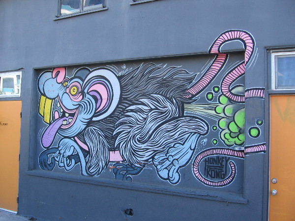 Look on the old Jerome's warehouse wall! It's a bizarre rat-like animal that farts green gas! Artist Adam Hathorn is Honkey Kong!