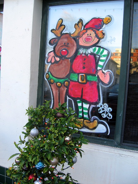 Rudolph and an elf are also hanging out in Little Italy while Santa pays his visit. It seems everyone loves Italian food!