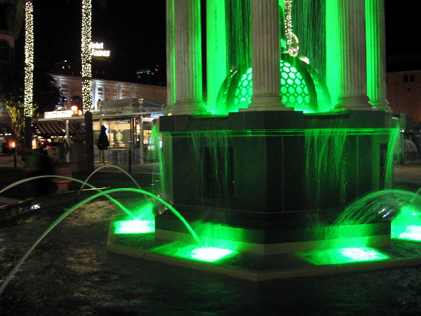 Light changes from red to green as water splashes in the beautiful 1910 Broadway Fountain designed by noted architect Irving J. Gill.