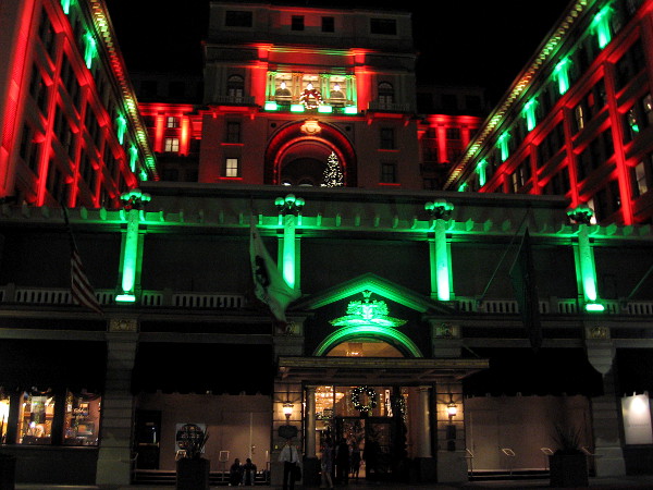 Across Broadway from Horton Plaza Park, the historic U.S. Grant hotel is also lit in Christmas colors for the holiday season.