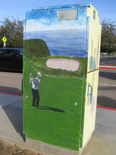 Another corner of the same intersection has a utility box with four cool images. This side shows a golfer taking a swing at the nearby Torrey Pines Golf Course.