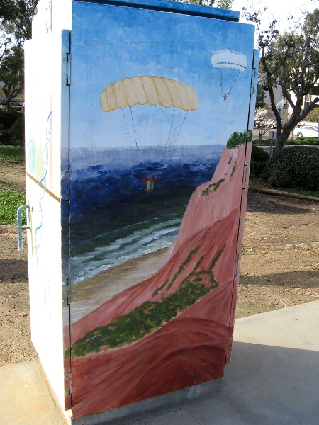 Also nearby is the Torrey Pines Gliderport. This fun street art depicts a couple of paragliders soaring above the Pacific Ocean!
