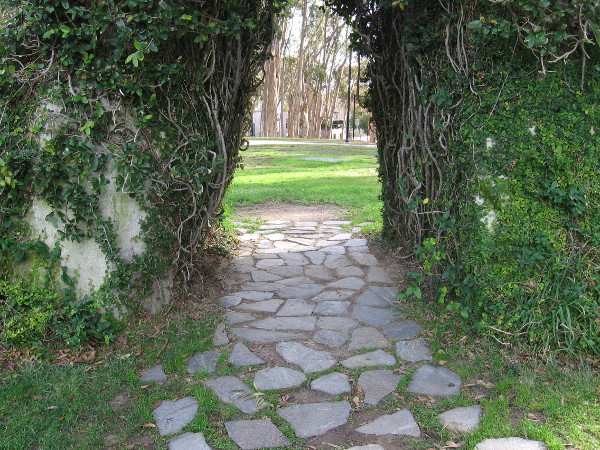 A path of stones leads through the Sun God's green archway.