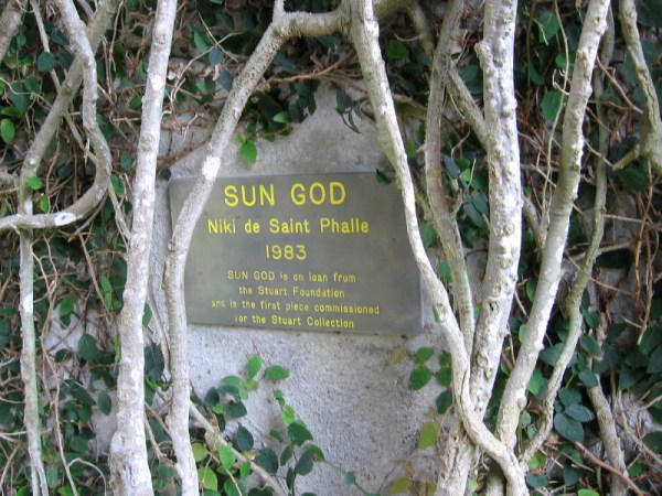Plaque reads SUN GOD, Niki de Saint Phalle, 1983. It's on loan from the Stuart Foundation.