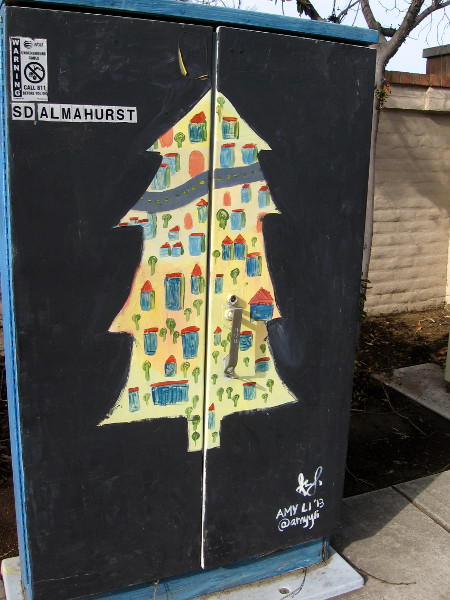 This urban art seems to depict a city inside the form of a tree.