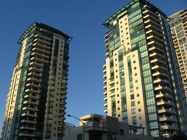 The beautiful Horizons Condos San Diego towers catch light from the rising sun.
