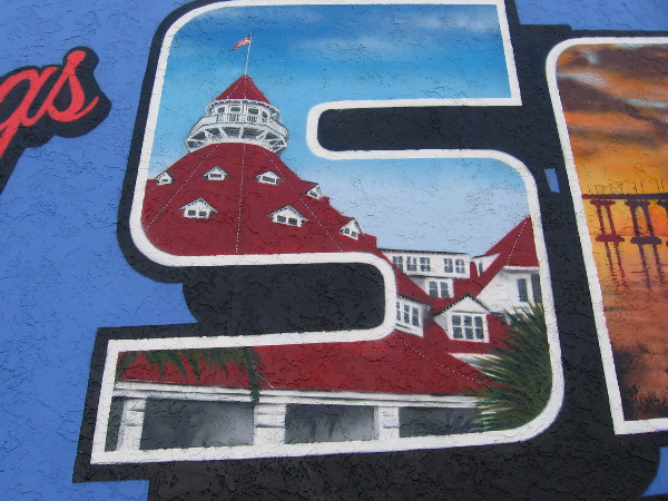 The distinctive Victorian roof of the Hotel del Coronado, a top San Diego resort and tourist attraction, appears in the letter S in a North Park mural.