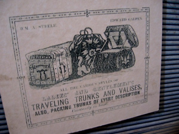 Advertisement shows Ladies' and Gentlemen's traveling trunks and valises, also packing trunks of every description.