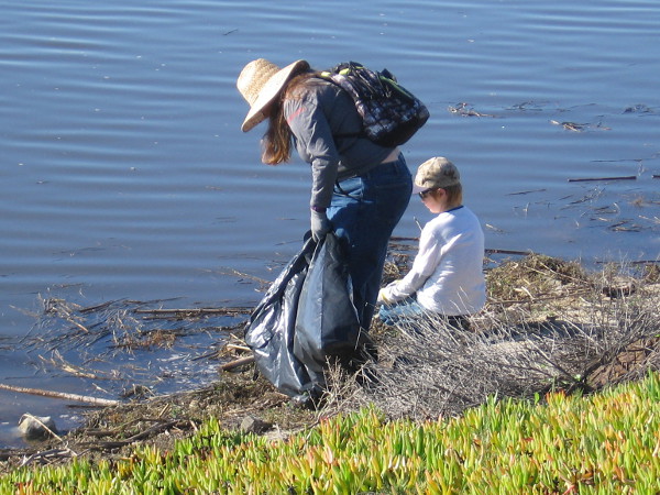 Volunteering is often a family affair, teaching the next generation about generosity and responsibility.