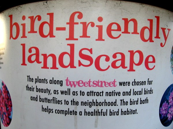 A sign in the Tweet Street linear park on Cortez Hill shows beautiful plants that attract local San Diego birds and butterflies.