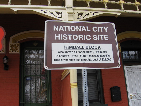 Sign reads National City Historic Site - Kimball Block - Also known as Brick Row, this block of Eastern-style flats was completed in 1887 at the then considerable cost of 22,000.