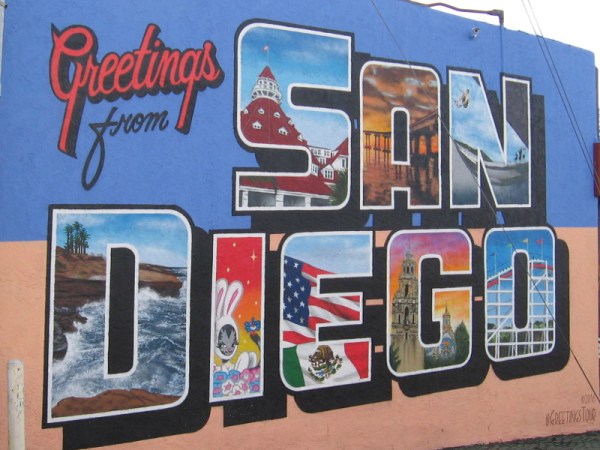 Greetings from SAN DIEGO. Cool urban art on 30th Street, just south of El Cajon Boulevard in North Park. Locations in the letters include the Ocean Beach Pier, La Jolla Cove and the Giant Dipper Roller Coaster at Belmont Park in Mission Beach.