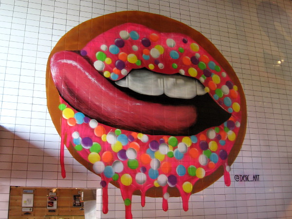 Cool artwork on wall in the famous Donut Bar in downtown San Diego.