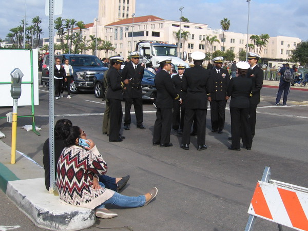 Some Navy officers gather near the MLK Day Parade's starting area.