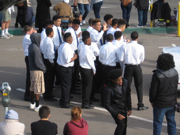 Fellowship and laughter in one group before beginning down the parade route.