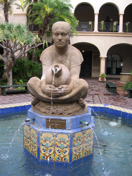 An iconic sculpture in the rain-wet courtyard of the House of Hospitality. Aztec Woman of Tehuantepec by Donal Hord, 1935.